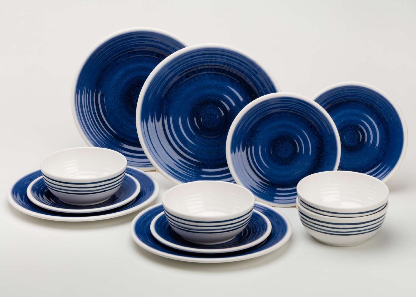 Deep blue patterned plates and white bowls from the Marine Look plates and glasses catalogue