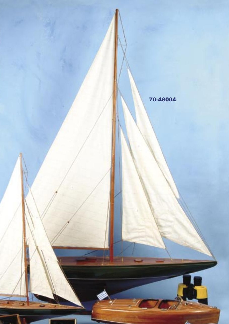Large Shamrock sailing yacht model with white sails